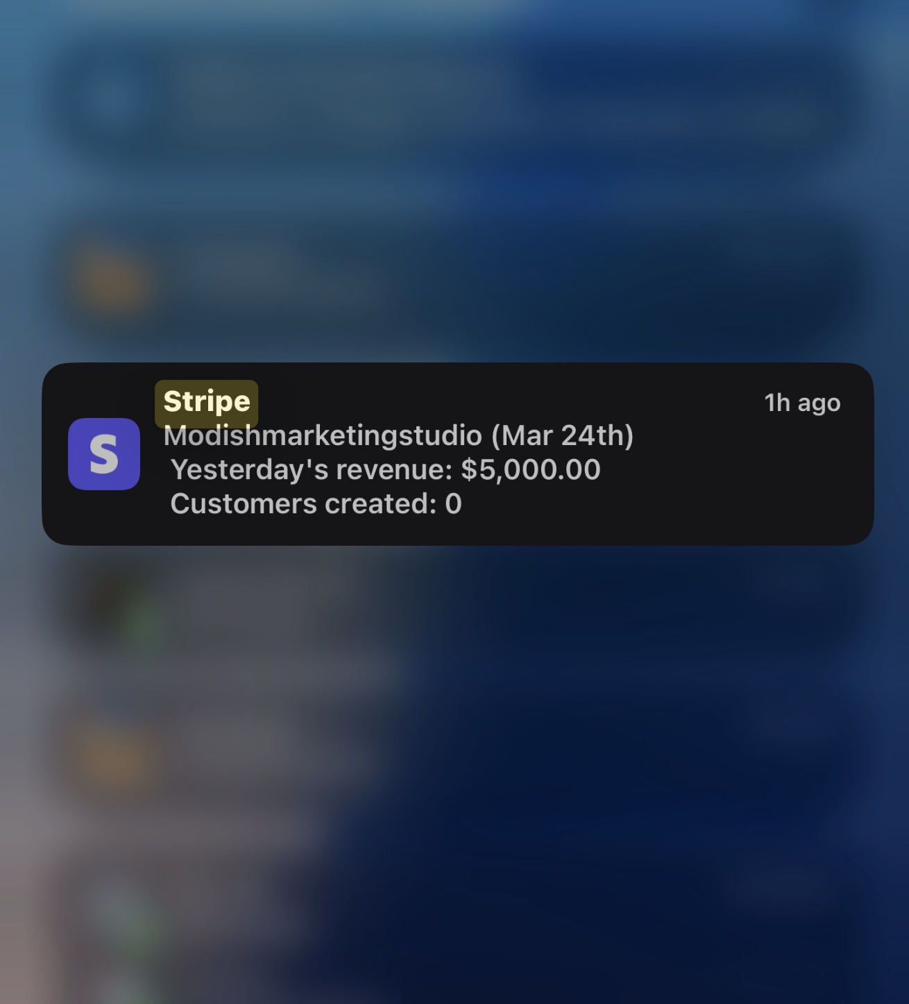 Stripe notification showing $5,000 in revenue for Modish Marketing Studio in March